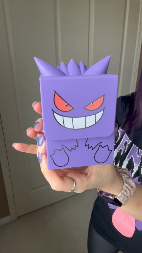 Instagram post by @allycatastrophe for Pokémon. Caption reads: [...] This is the Gengar Deck Box from the Pokémon....