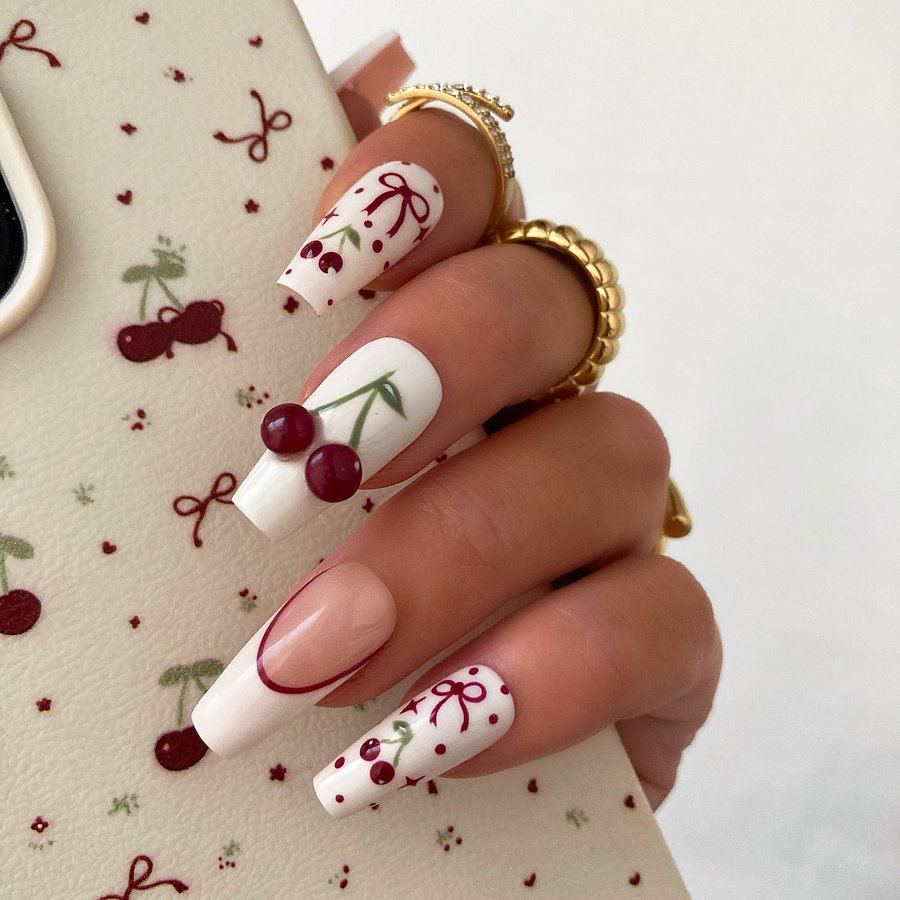 Instagram post by @pressedbycharlotte_ for Coconut Lane. Caption reads: Cute nails to match with my cute @coconutlaneuk....