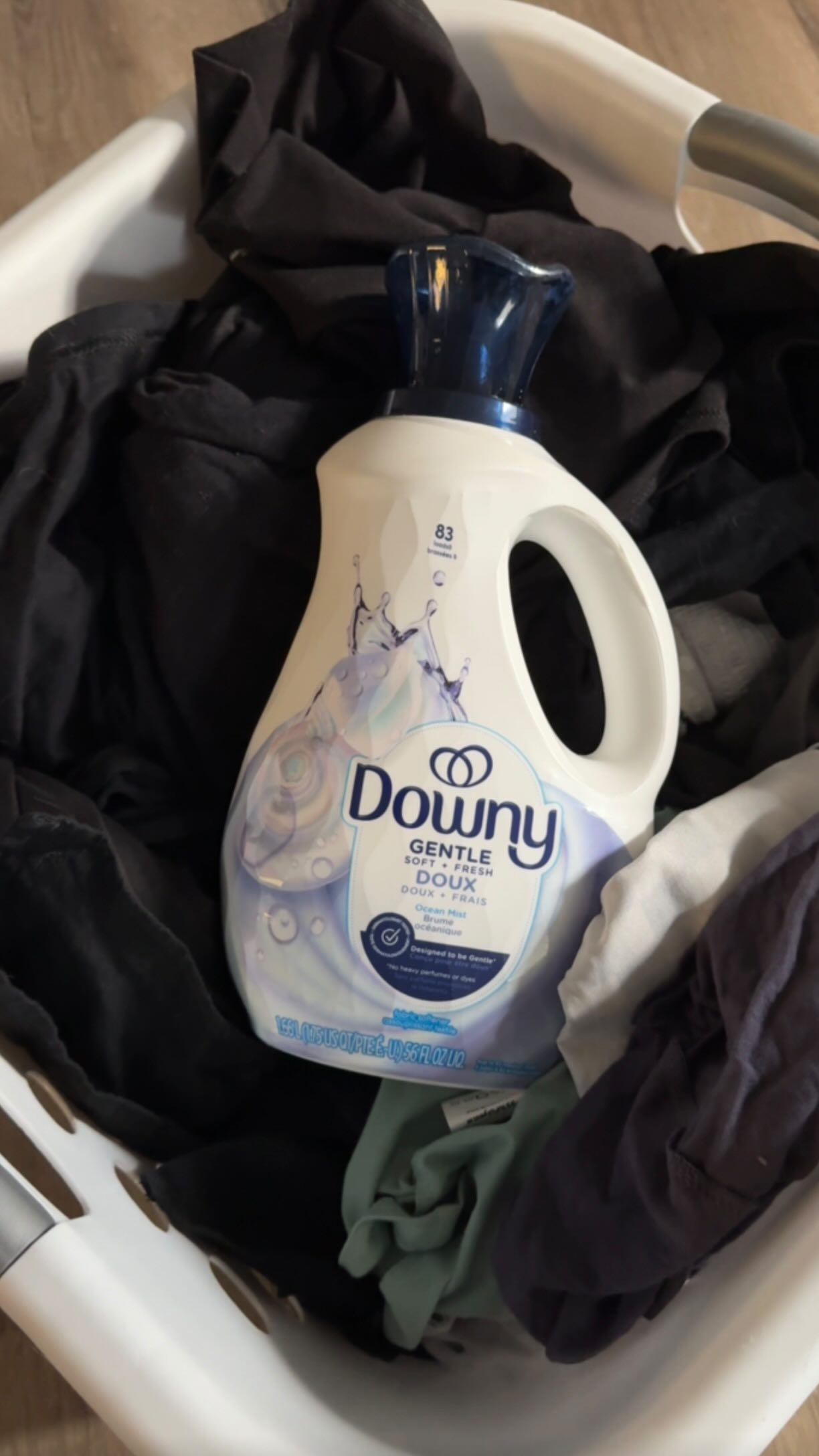 Instagram post by @livingonaloonie for downy. Caption reads: #ad | New product alert! Downy Gentle Soft & Fresh....