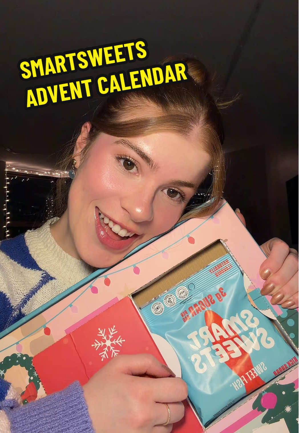 TikTok post by @cup.of.morning.swag for SmartSweets. Caption reads: Unboxing the @SmartSweets advent calendar!! Great....