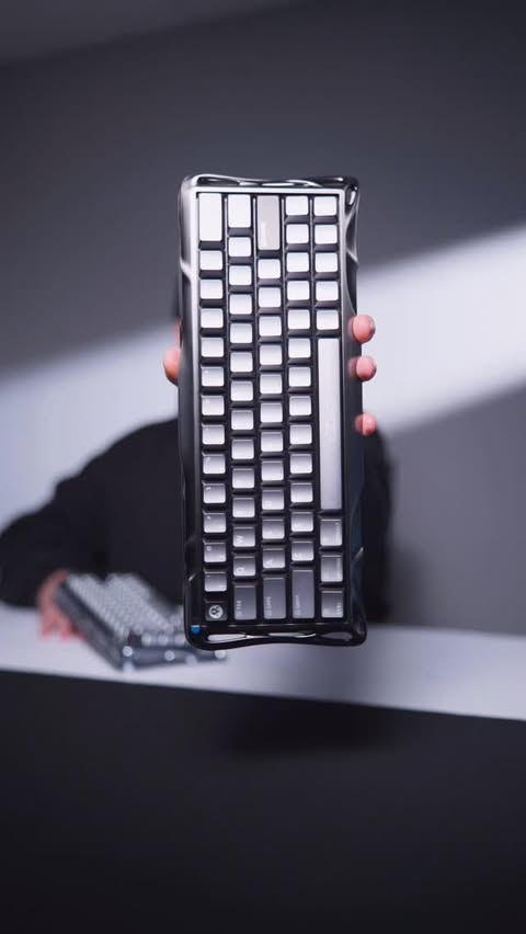 Instagram post by @ogrobbytv for GravaStar. Caption reads: Who needs a new keyboard? @gravastar #keyboard #pc....