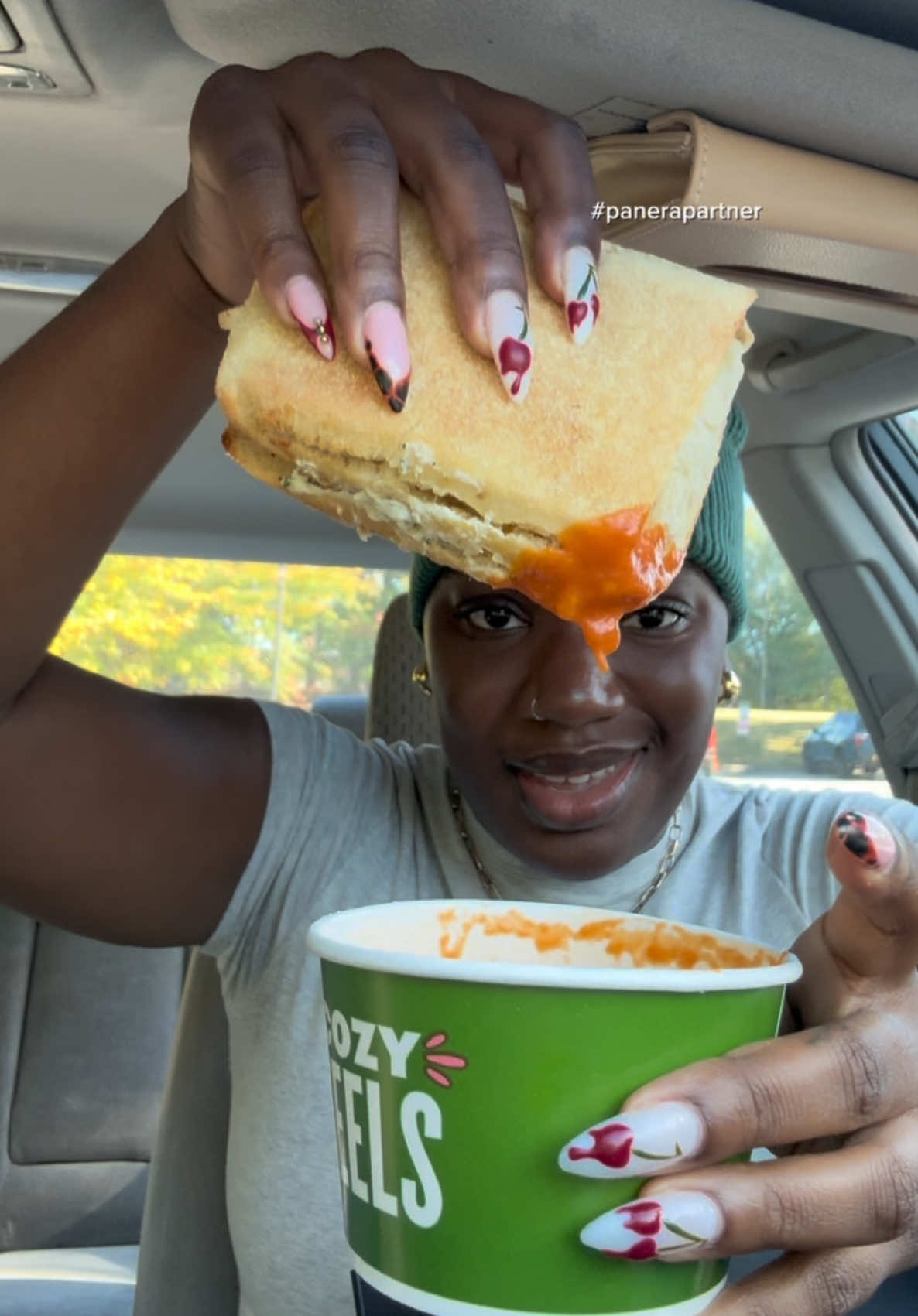 TikTok post by @sharidyonne for Panera Bread. Caption reads: #PaneraPartner A warm sandwich that comes with....