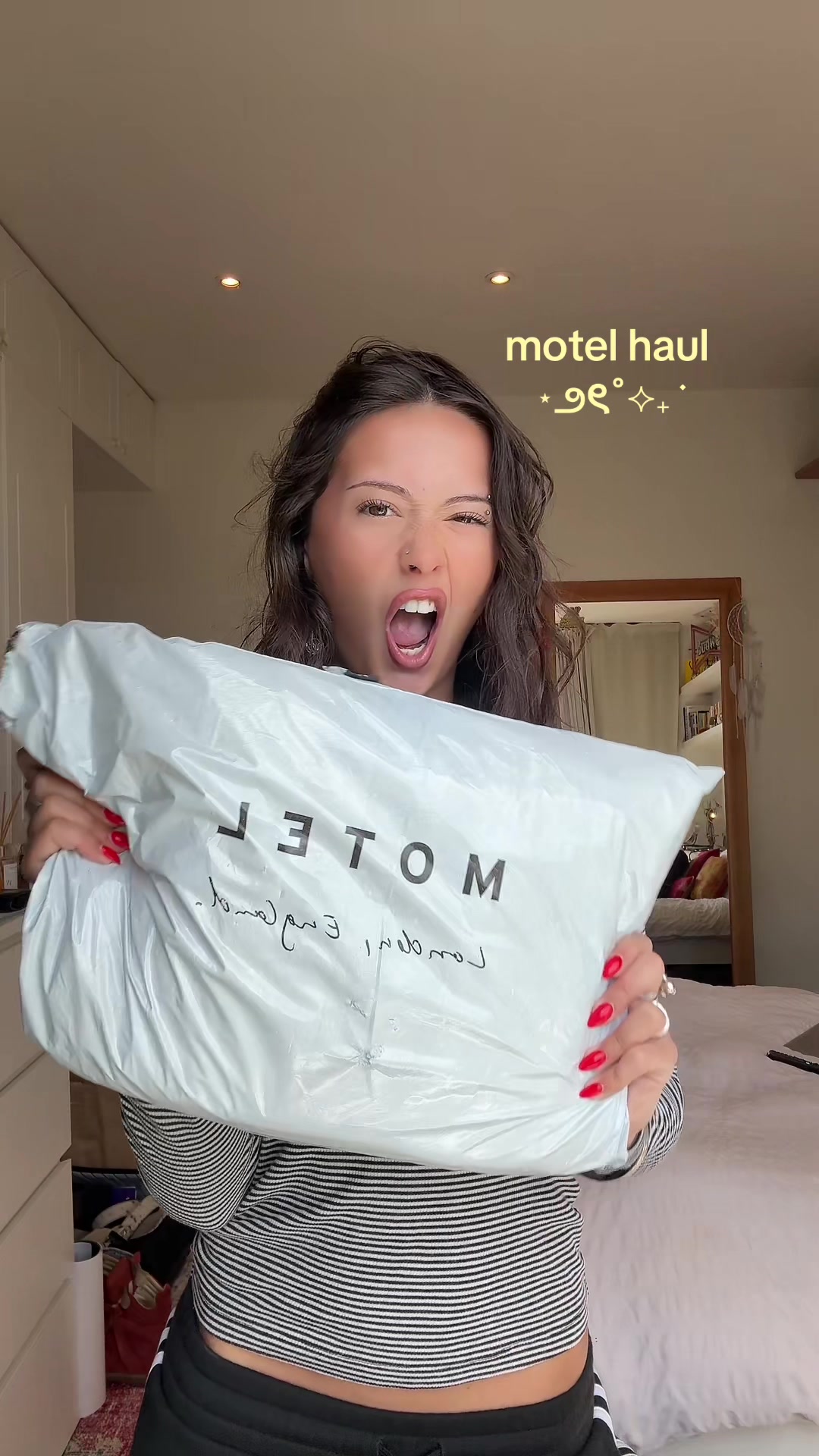 TikTok post by @guccicoochie for MOTEL. Caption reads: mini motel haul🤍🤍 @MOTEL #gifted #fashion....