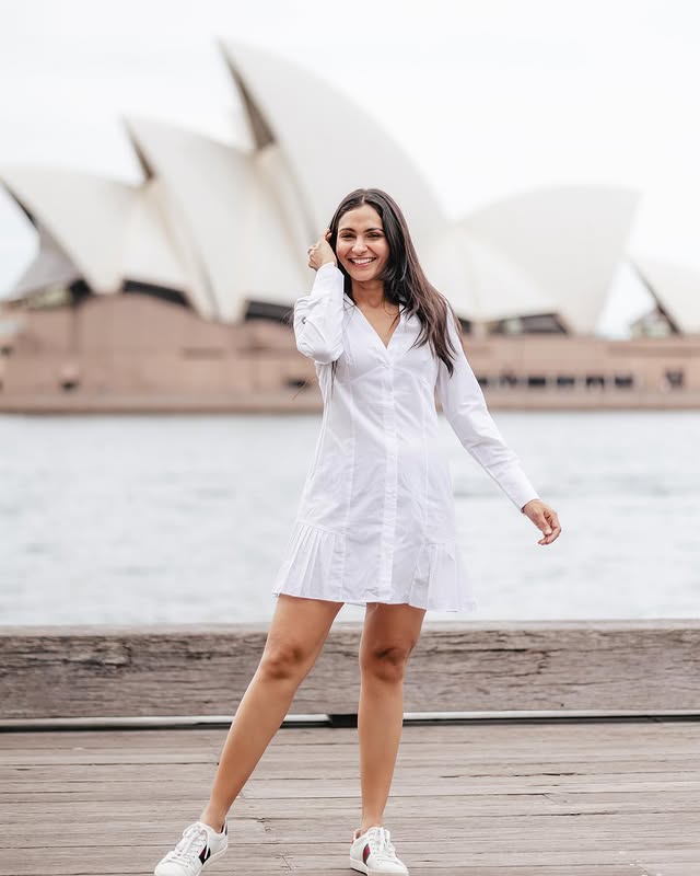 Instagram post by @therealandreajeremiah for GT Holidays. Caption reads: [...] #sydney #operahouse #nsw #travel #gtholidays.