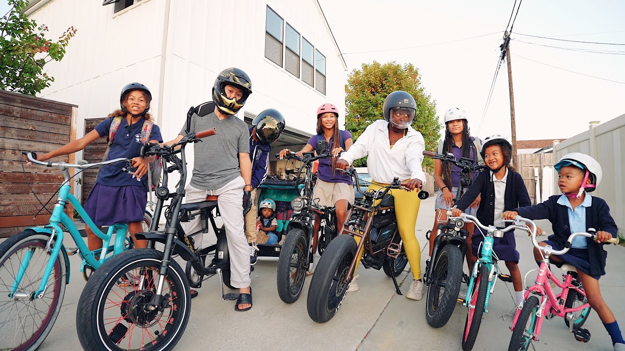 YouTube post by @MAZELEE for Chomps. Caption reads: Surviving the FiRST DAY OF SCHOOL with 8 KiDS....