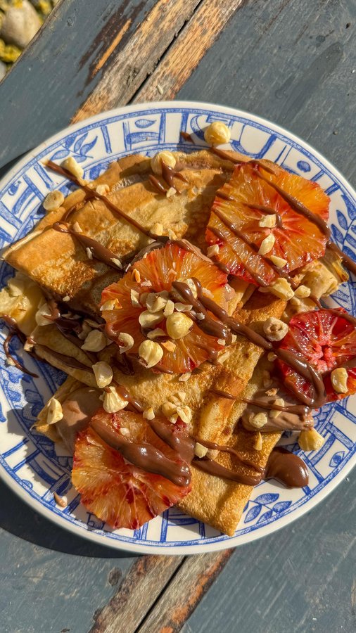 Instagram post by @the.happyolive for Merchant Gourmet. Caption reads: Your healthy Nutella alternative. Give this recipe....