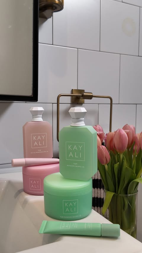 Instagram post by @scotlouie for KAYALI FRAGRANCES. Caption reads: Stay at home Diva Glam with @kayali YUM lip & body....