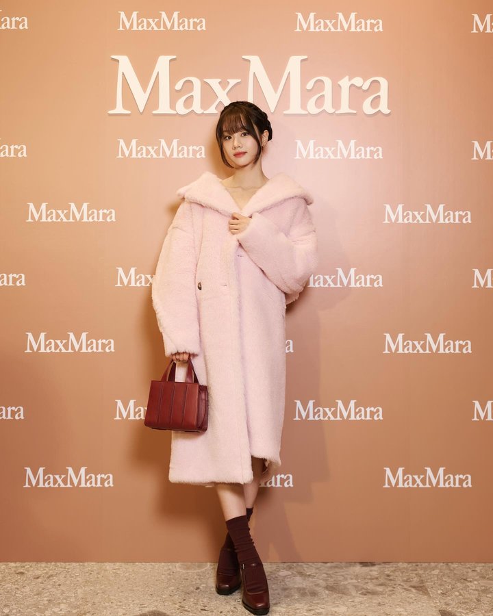 Instagram post by @hyeri_0609 for Max Mara. Caption reads: Excited to celebrate the re-opening of Max Mara at....
