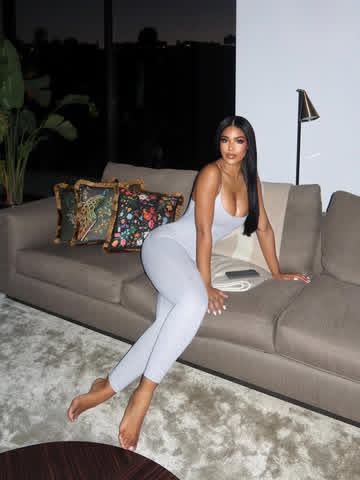 Instagram post by @andreinasntos for Rainbow Shops. Caption reads: cozy nights 🤍

@rainbowshops #ad.