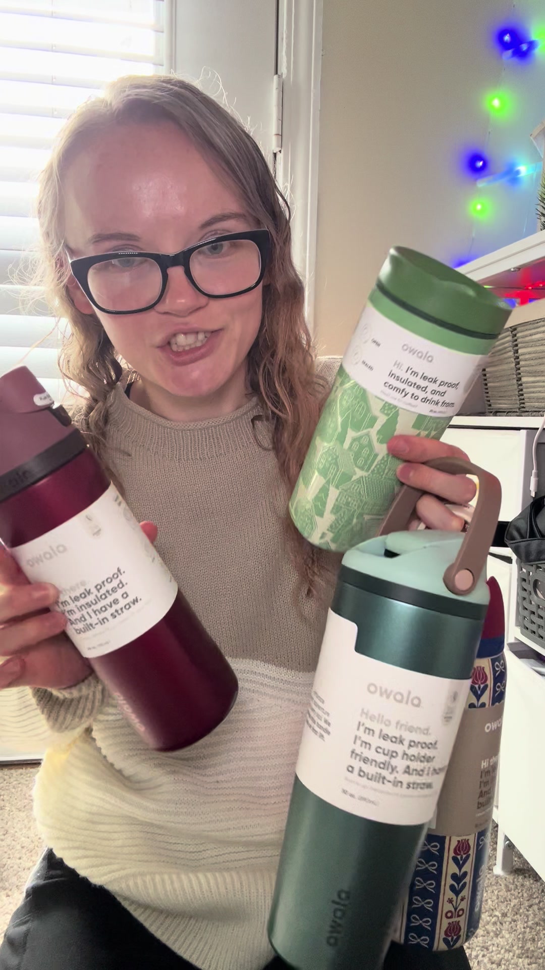 TikTok post by @logan_mama_wifey for Owala. Caption reads: Holiday limited edition! @Owala #cups.