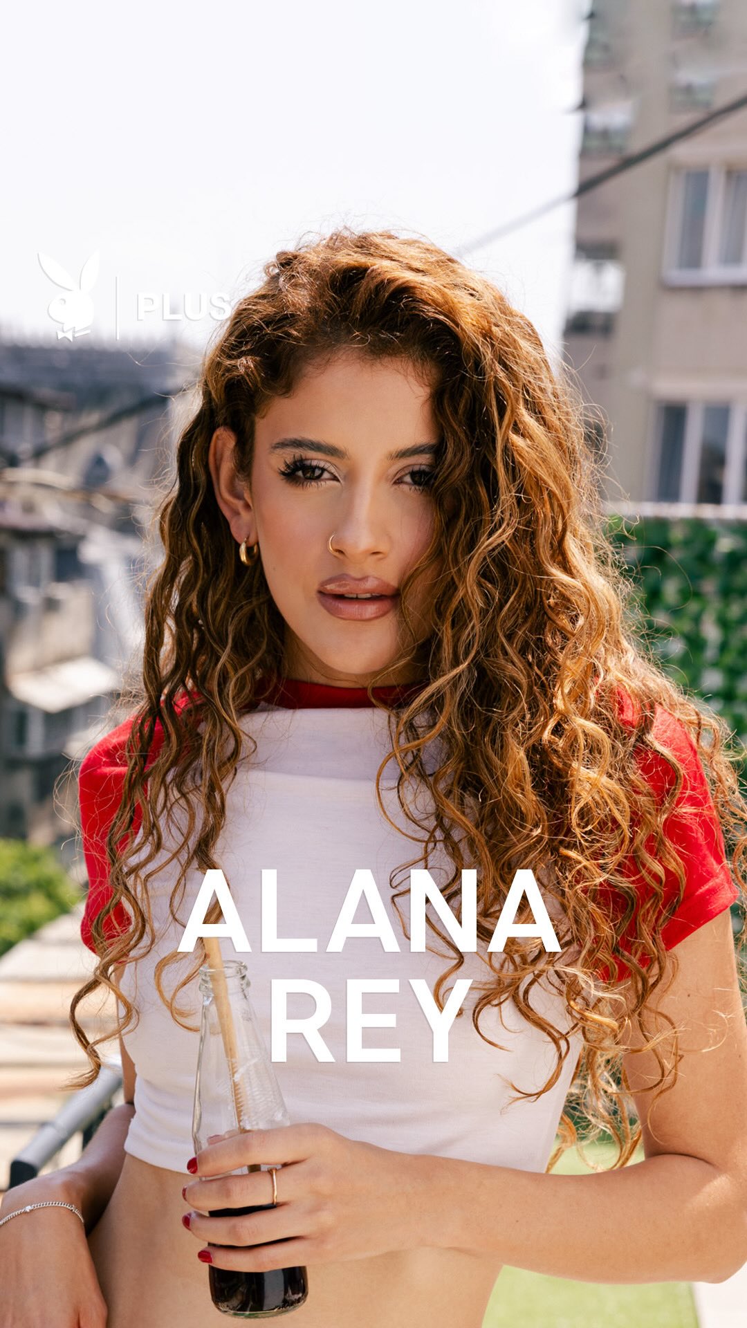 Instagram post by @alanaxv.x for Playboy. Caption reads: Perched high above the city's skyline, Playboy....