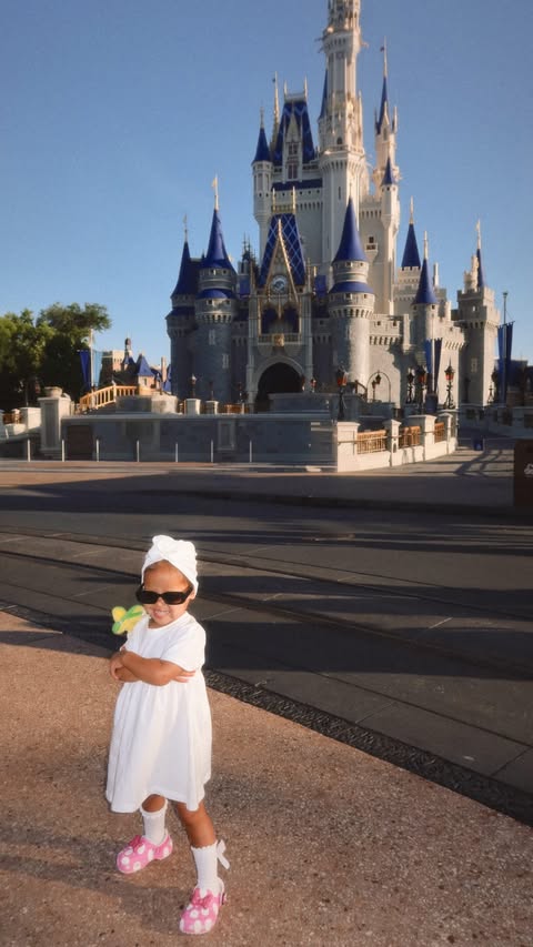Instagram post by @myleyj for Disney Parks. Caption reads: [...] battle? my vote is mama odie 🕶️🐍....