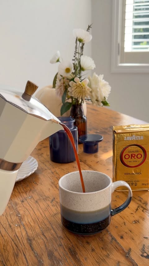 Instagram post by @lifeisaparty for Lavazza. Caption reads: [...] own backyard tree, alongside a cup of....