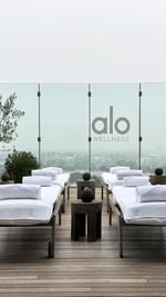Instagram post by @alo for Brooklinen. Caption reads: A retreat to remember 🌿 Embracing wellness in all....