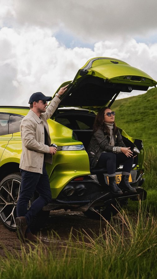 Instagram post by an influencer for Aston Martin. Caption reads: [...] our time off-roading in the @astonmartin....
