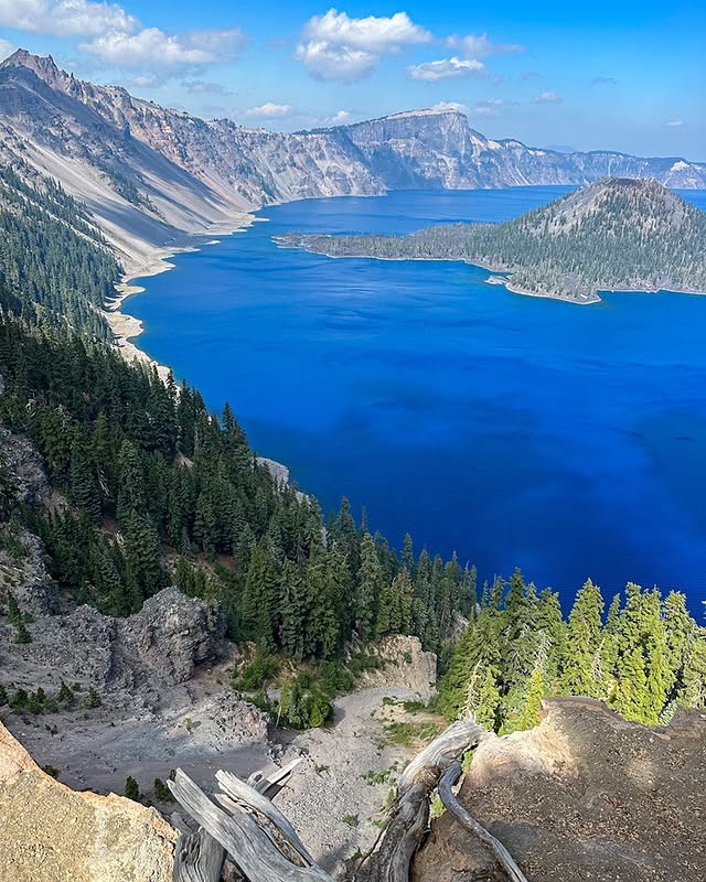 Instagram post by @adventures_az for Travel Oregon. Caption reads: Crater Lake was incredible from my adventure there....