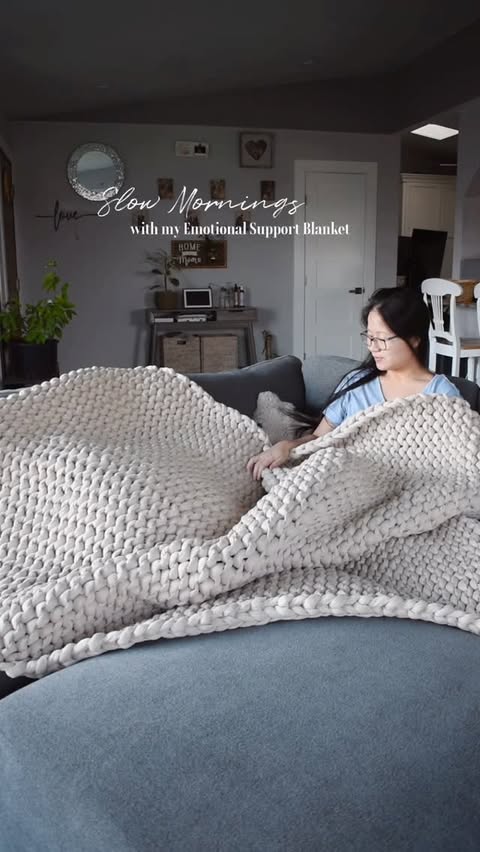 Instagram post by @bossbabykiki for Bearaby. Caption reads: [...] support blanket from @mybearaby 😂🧸 Made....