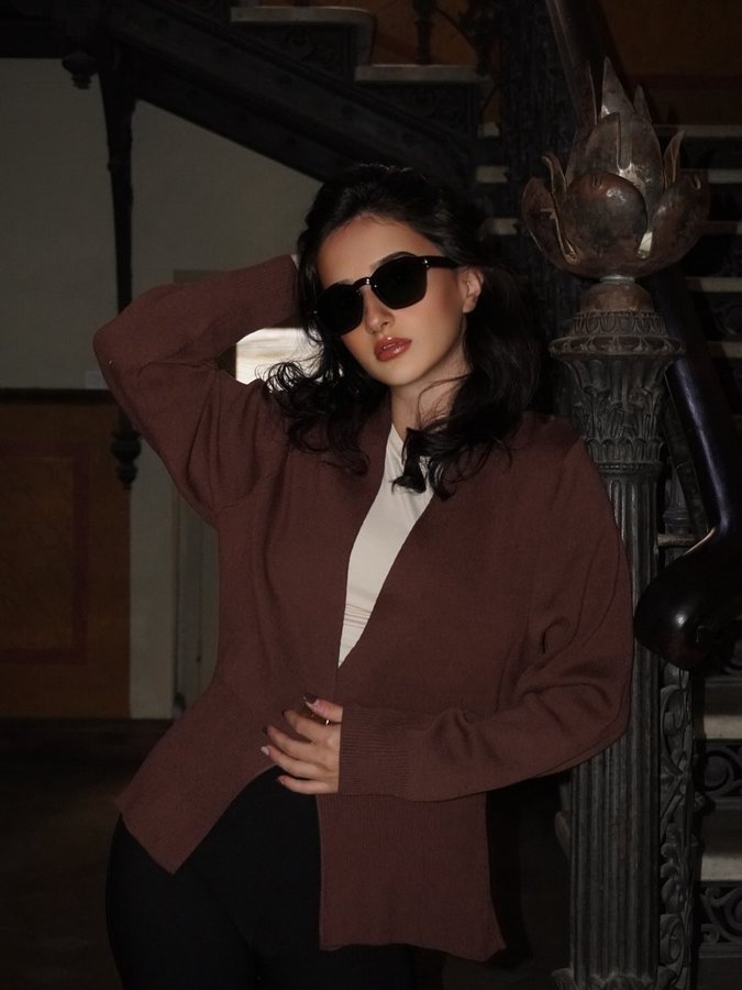 Instagram post by @evelinoragvelidze for SOJOS VISION. Caption reads: 🤎🤎.