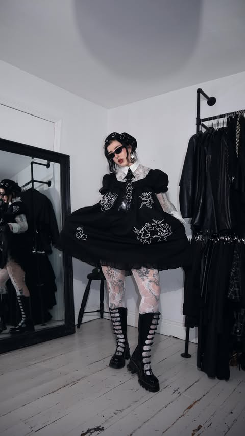 Instagram post by @mimi_almighty for Marc Jacobs. Caption reads: outfit building ⛓️‍💥 SAVE FOR INSPO !!🖤 
dress &....