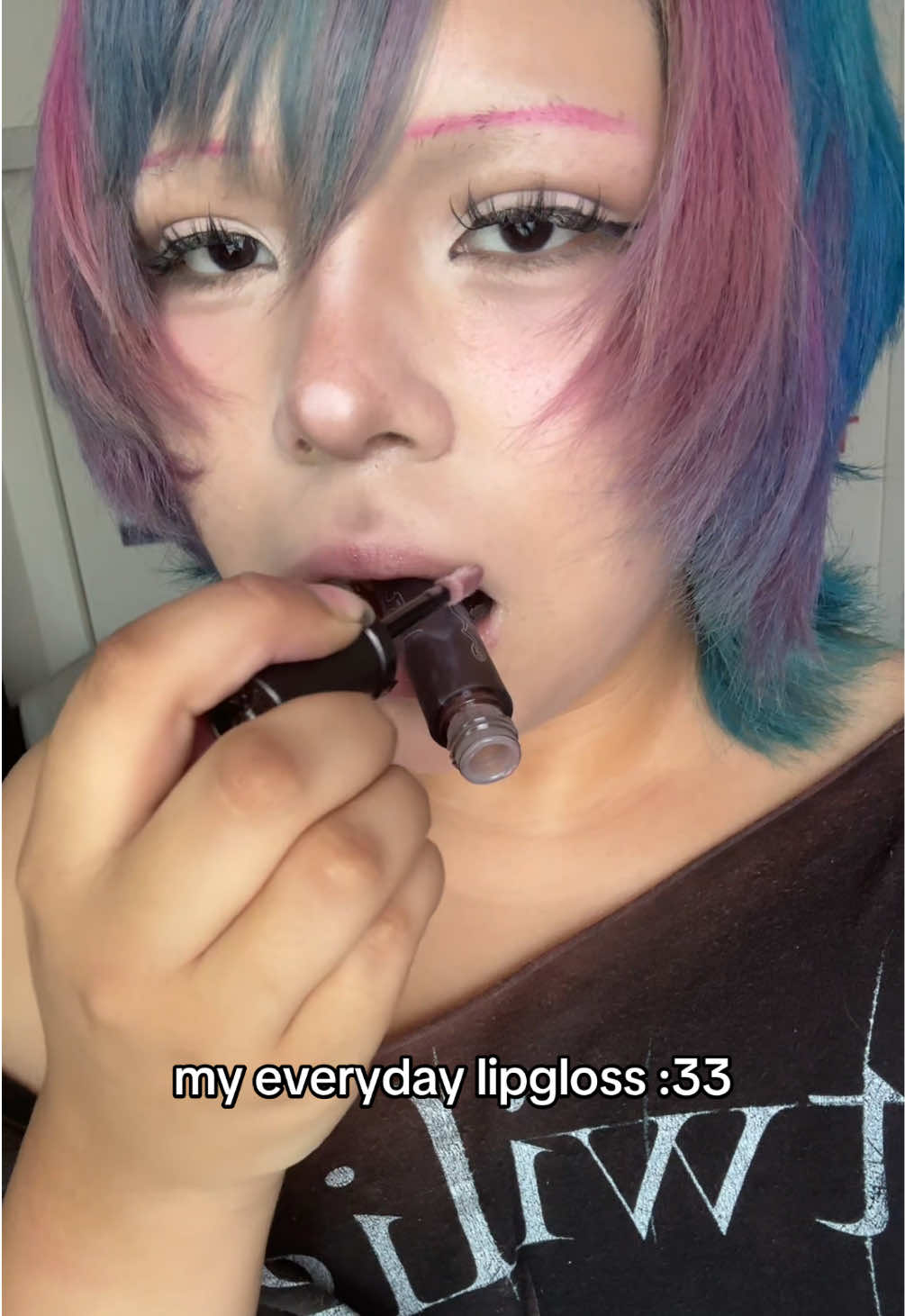 TikTok post by @internetnursee for Girlcult. Caption reads: my favorite/everyday lipgloss from girlcult!....