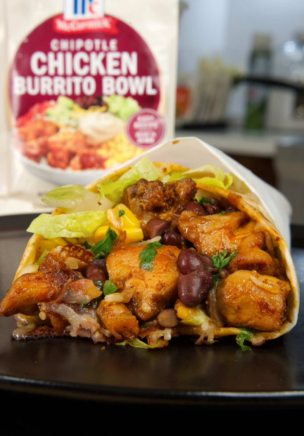 TikTok post by @thatsavagekitchen for McCormick. Caption reads: Easy 30-Minute Chipotle Chicken Meal (Wraps or....