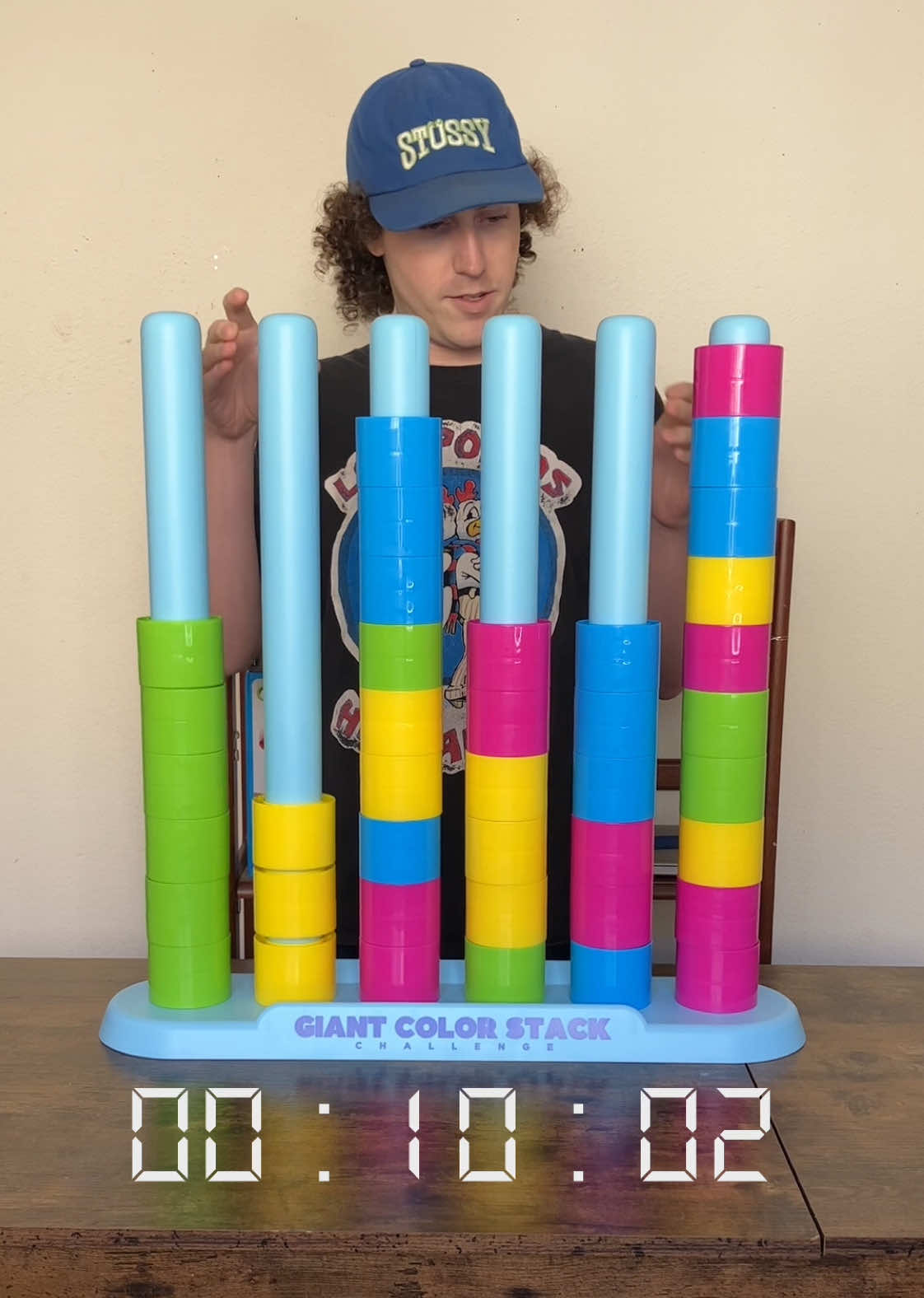 TikTok post by @nateandcaseyb for What Do You Meme?. Caption reads: Who can sort the colors the fastest?🌈🏁....