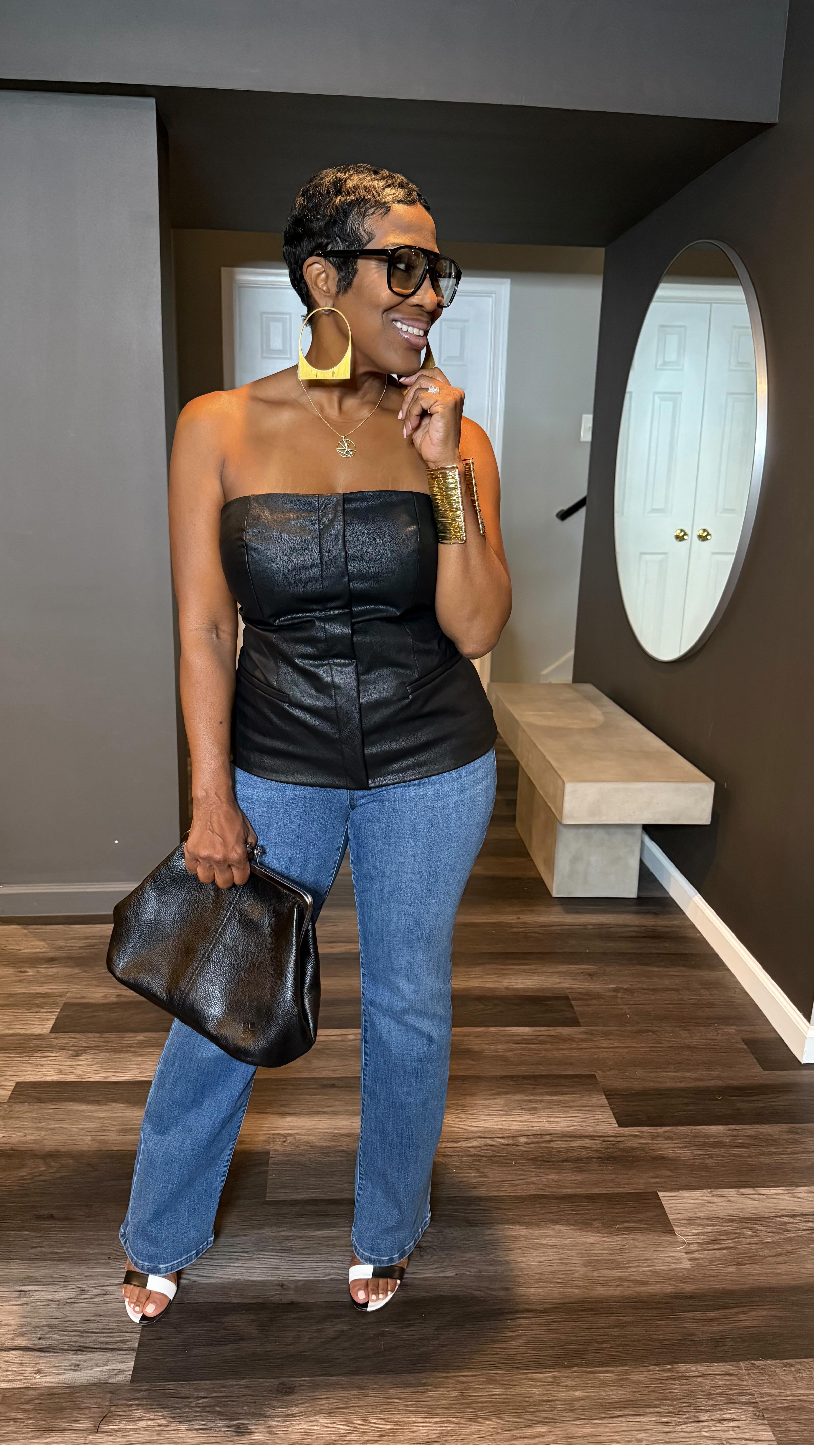 Instagram post by @itsjacqueblue for Patricia Nash Designs. Caption reads: ✨ Date Night Vibes ✨
Wearing this sleek black faux....