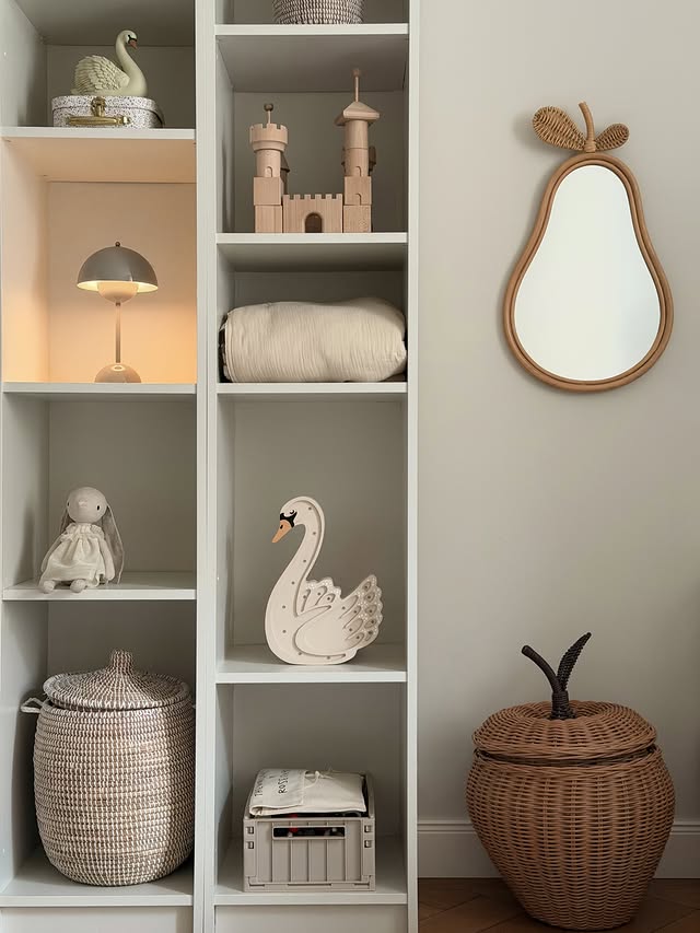 Instagram post by @interior_by_helen_wizemann for Liewood. Caption reads: #shelfiedecor in our kids room Soft tones, natural....