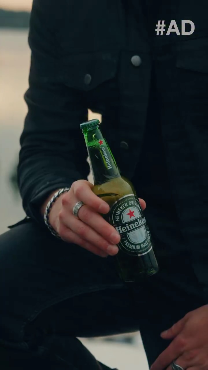 Instagram post by @gr1fn for Heineken US. Caption reads: #ad 21+ The summer I went all in on CHASING the....