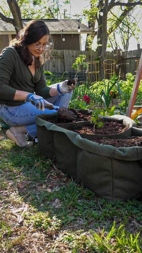 Instagram post by @gardens_better_with_cats for Smart Pot. Caption reads: The world can’t end just yet - I planted more....