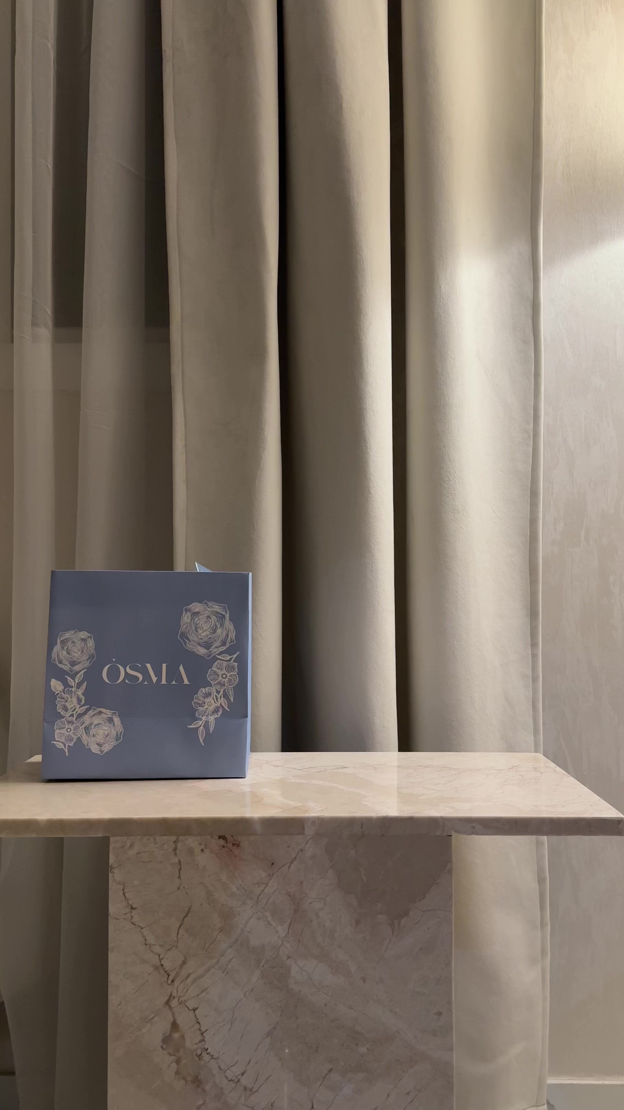 TikTok post by @amani14z for Osma Perfumes. Caption reads: @اوسما | OSMA كود الخصم Au1 #اوسما #osma #اعلان.