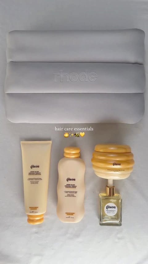 Instagram post by @lifestyle.debi for Gisou. Caption reads: my current essentials for healthy and shiny hair💛....