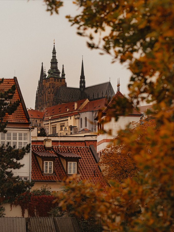Instagram post by @gisforgeorgina for Mandarin Oriental. Caption reads: “The streets of Prague were a fantasia scarcely....