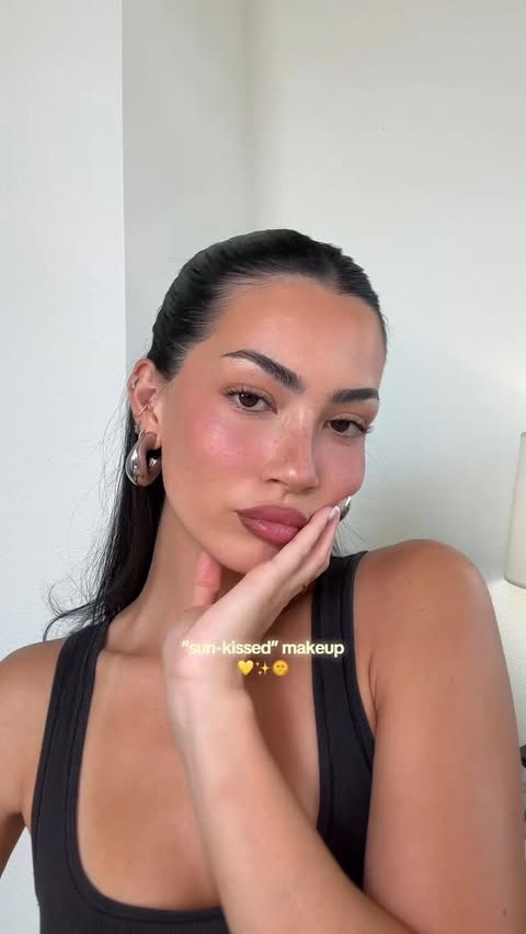 Instagram post by @isarahbutler for Milani Cosmetics. Caption reads: [...] ✨🌞💛 Ad Makeup used: @milanicosmetics SPF....