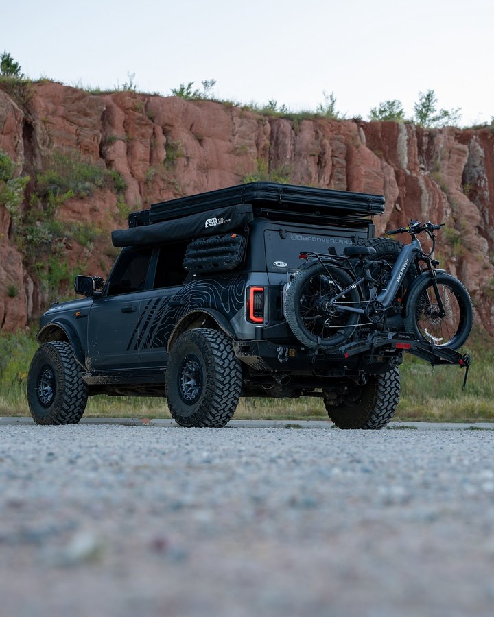 Instagram post by @badoverland for DV8 Offroad. Caption reads: The red rocks really pop off the gray.....