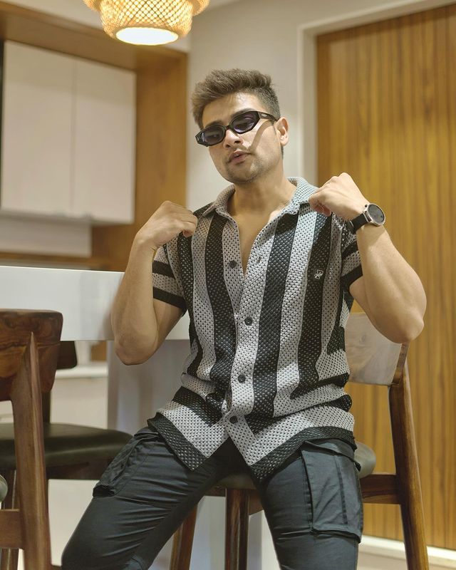 Instagram post by @iarmaan_official for Fugazee. Caption reads: [...] Crotchet knitted  Men’s Fashion wear by....