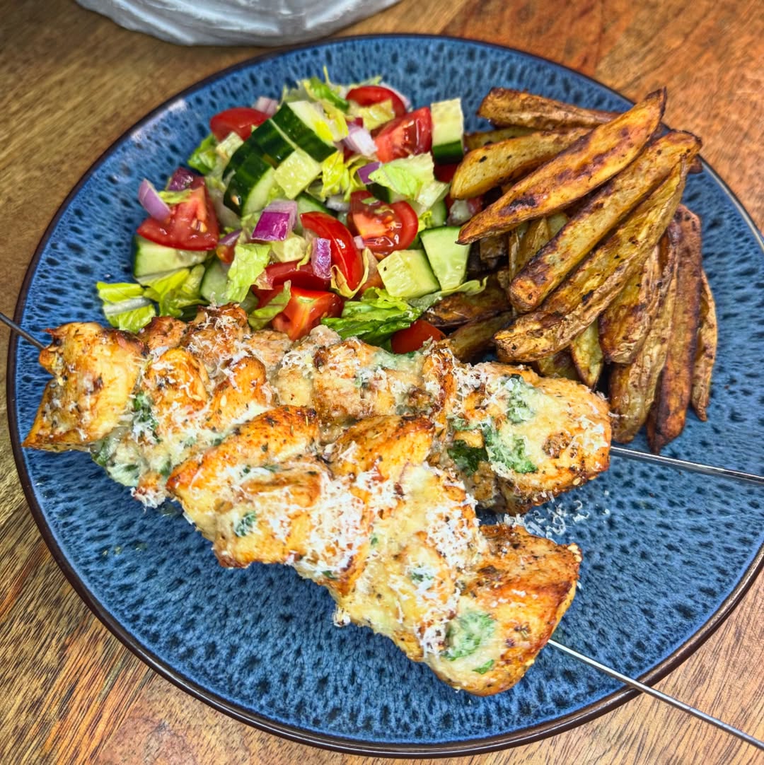 Instagram post by @sarah_cc_recipes for Jd Seasonings. Caption reads: Garlic butter & Parmesan skewers with chips &....