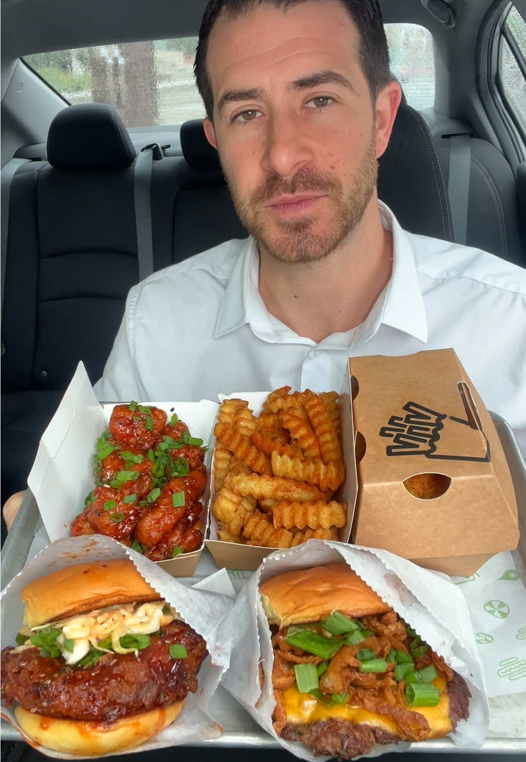 TikTok post by @1hourlunchbreak for Shake Shack. Caption reads: Trying @SHAKE SHACK NEW Korean Inspired Menu for....