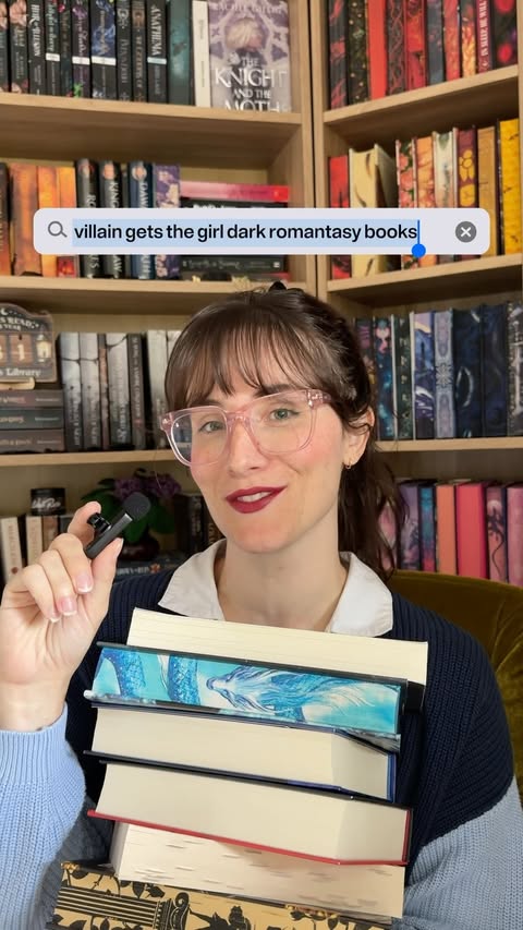 Instagram post by @karly_rose_reads for The Hive. Caption reads: Villain gets the girl 🤝 dark fantasy romance....