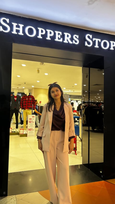 Instagram post by @rishita_munai for Shoppers Stop. Caption reads: [...] 50% OFF 🛍️✨ Only at @shoppers_stop....