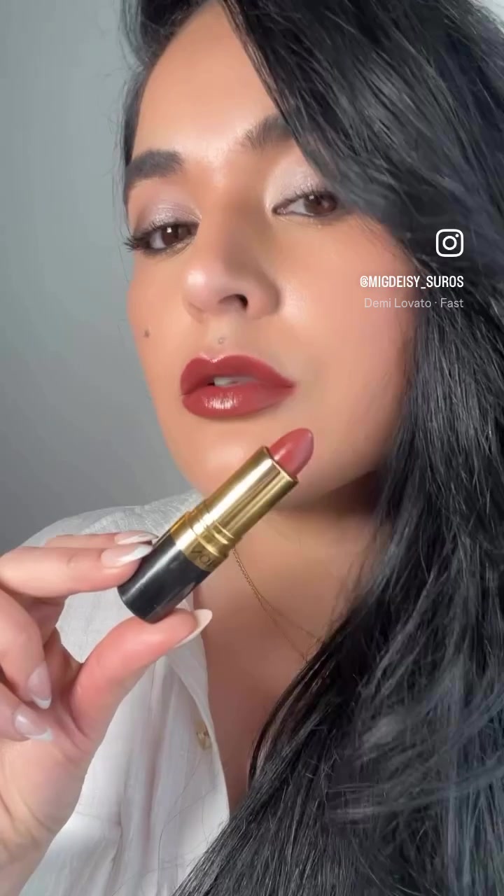 TikTok post by @migdymiller for Revlon. Caption reads: [...] #makeup #affordable #lipstick @Revlon....