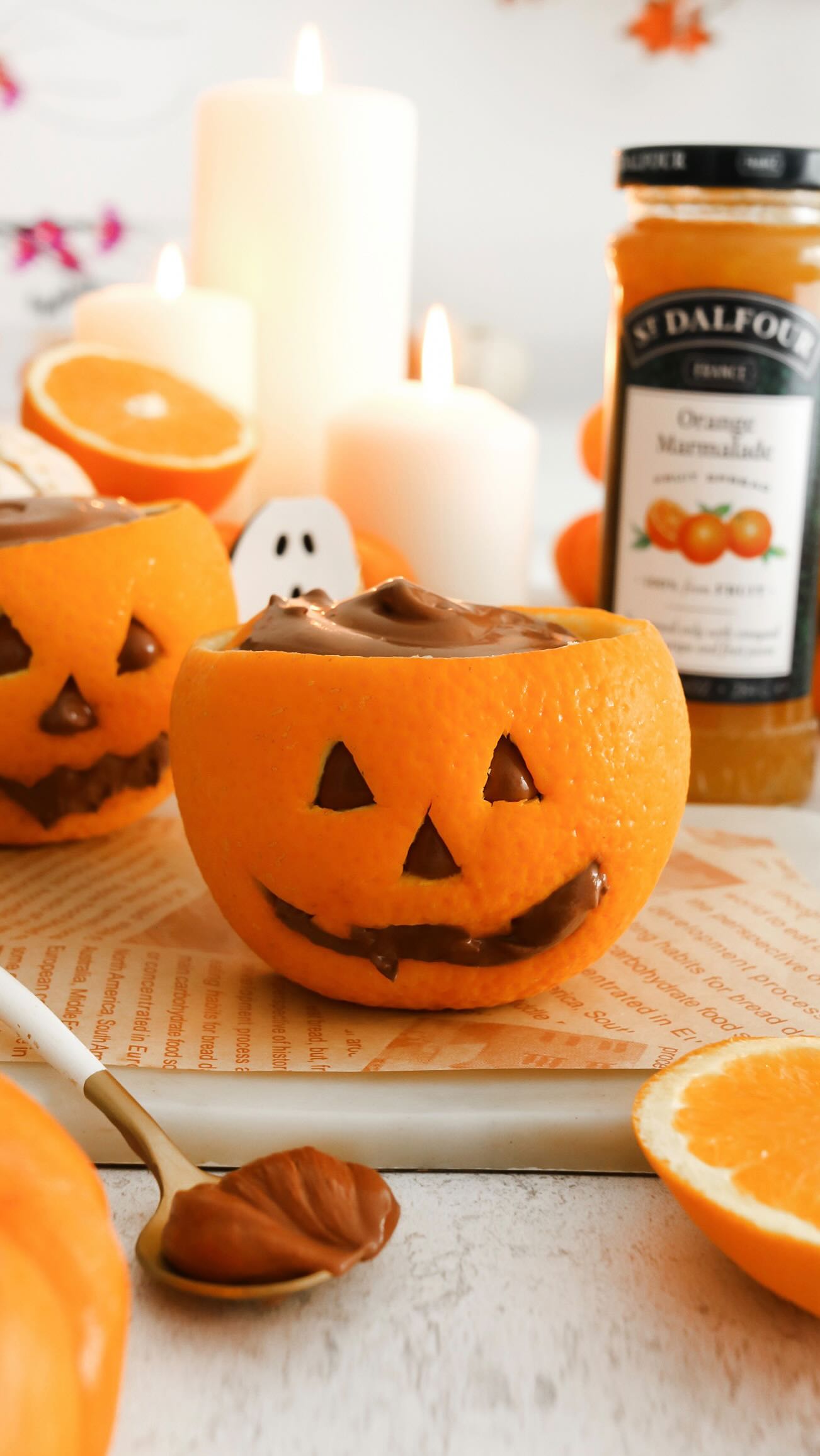 Instagram post by @thelittleblogofvegan for Bake from Scratch. Caption reads: Chocolate Orange Mousse Jack-O-Lanterns🎃 COMMENT....