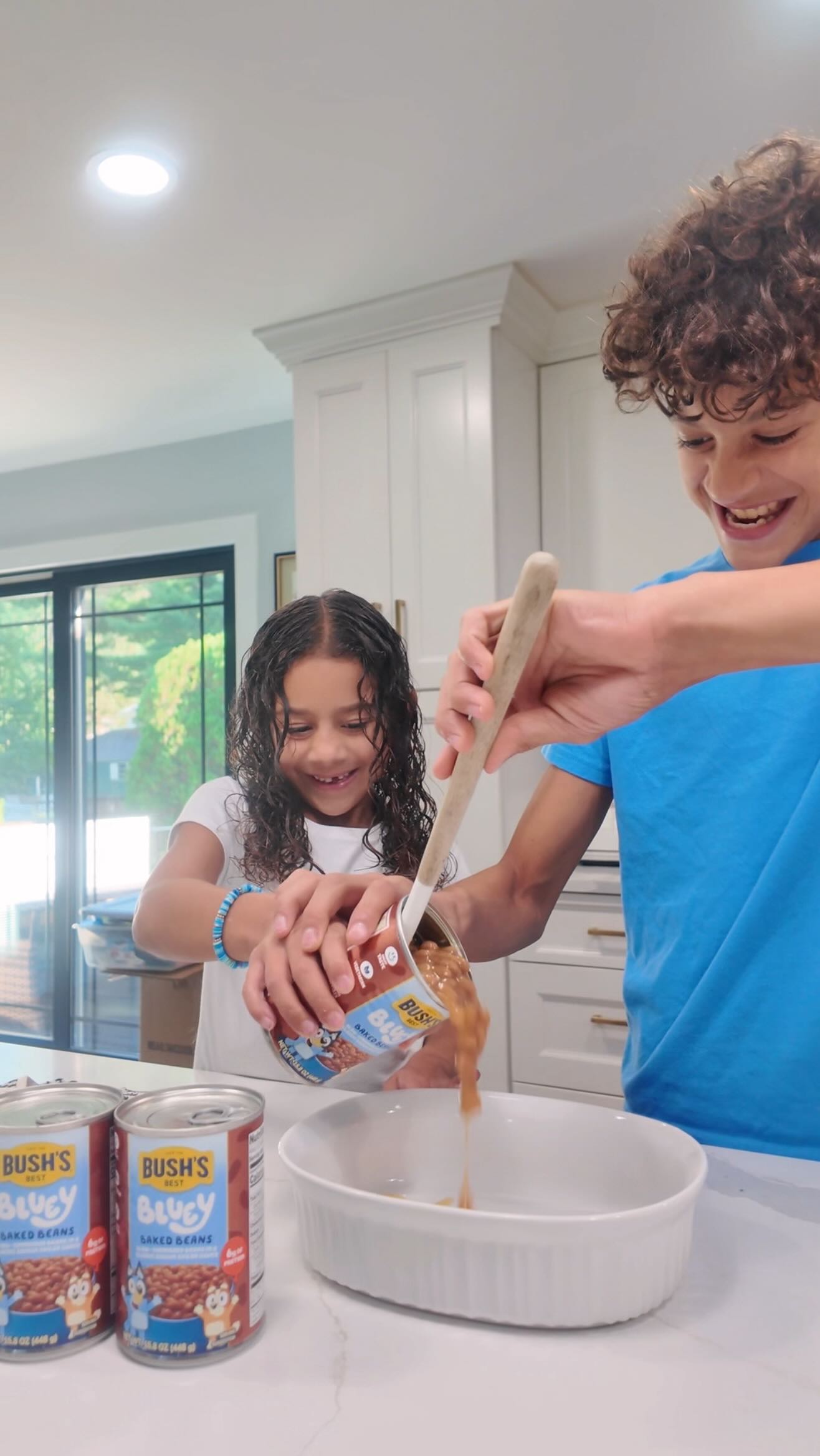 Instagram post by @em.loren_ for Bluey. Caption reads: #BushsBeansPartner Back-to-school chaos? Let’s....