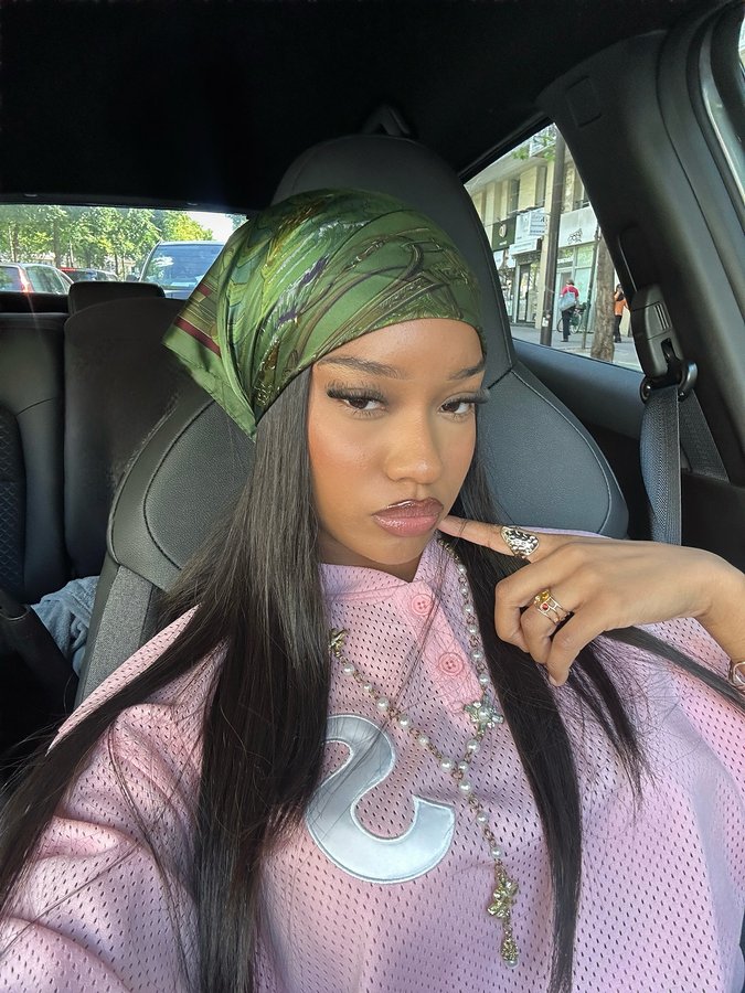 Instagram post by @lana_bkb for Supreme. Caption reads: 🩷💚.