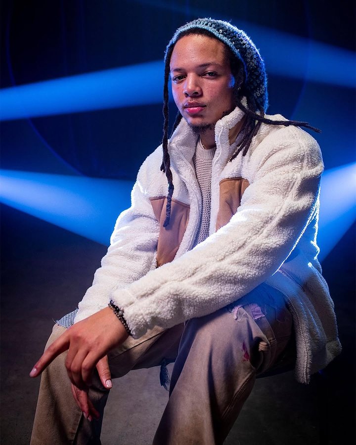 Instagram post by @domani for Genius. Caption reads: What’s the fuel to yo fire🔥?? @Genius @ugg....