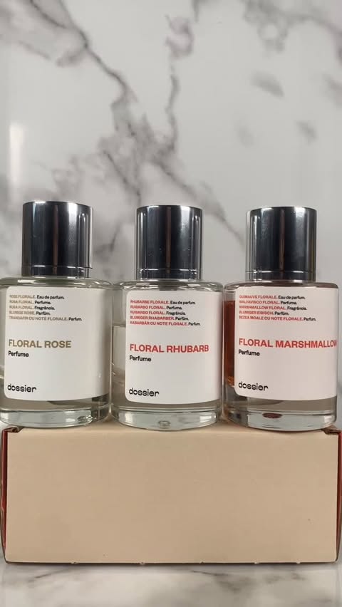 Instagram post by @ren.beauty.ugc for Dossier. Caption reads: [...] fan? Look no further than @dossierperfumes....