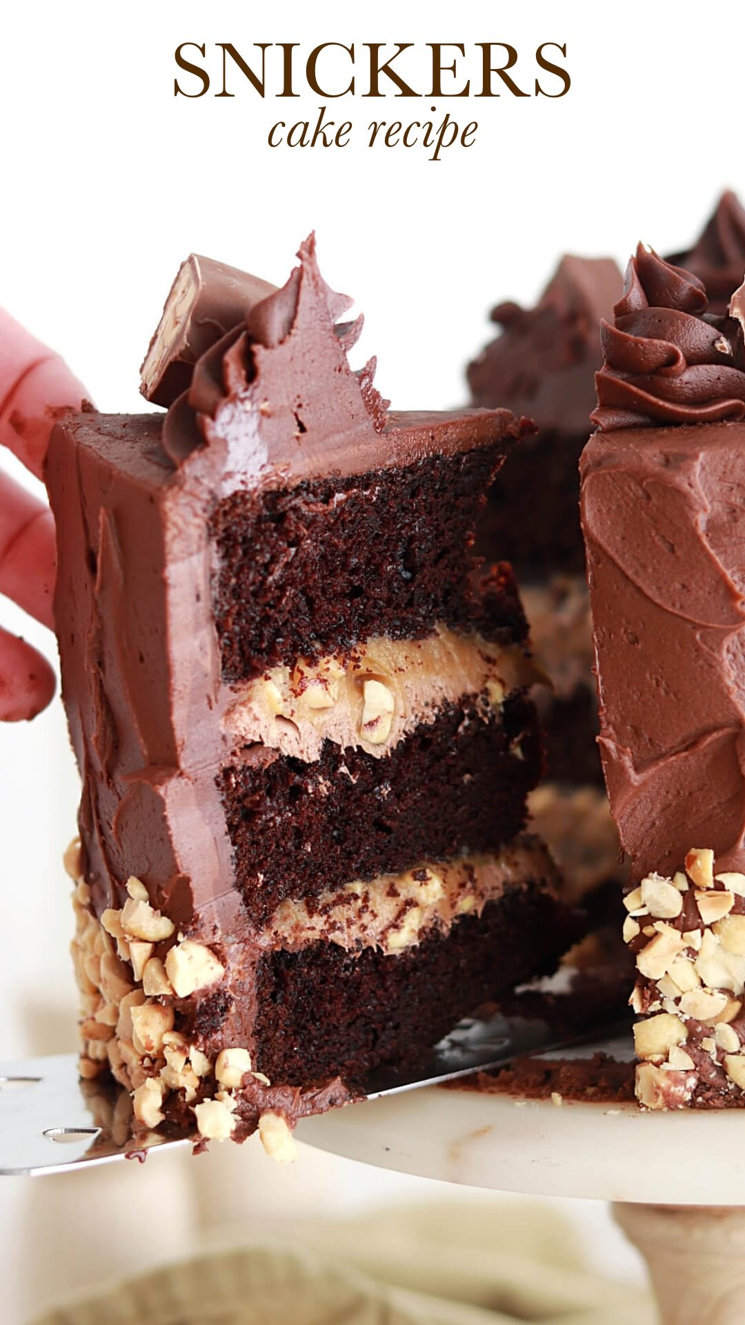 Instagram post by @sugarandsparrowco for Snickers. Caption reads: SNICKERS CAKE 🤎🥜 my current favorite Halloween....