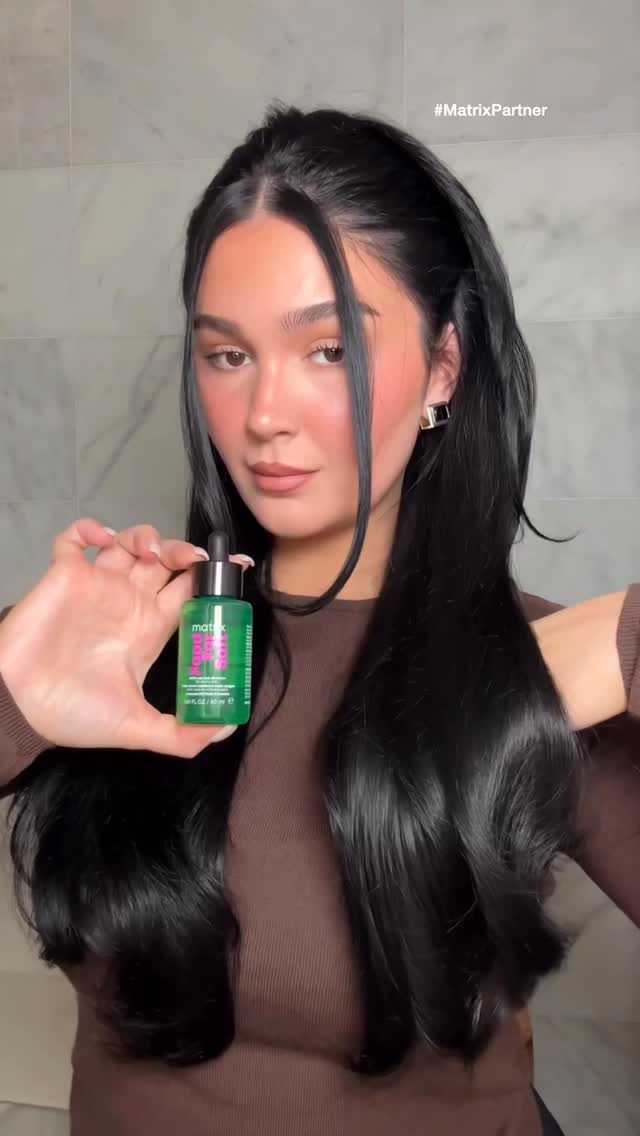 Instagram post by @madibernard for Matrix. Caption reads: the perfect holiday party hair look using the....