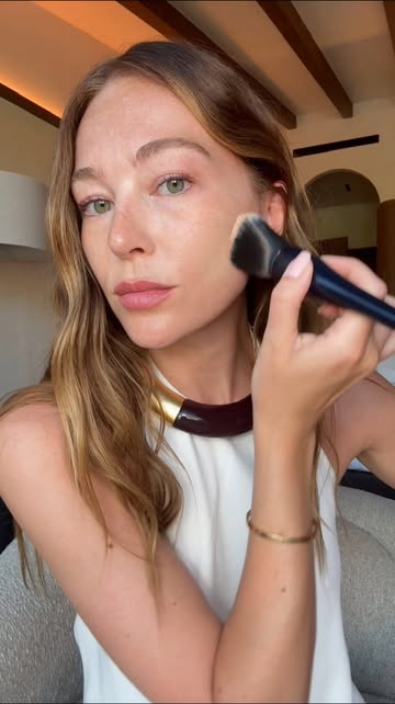 Instagram post by @holliehobin for Clé de Peau Beauté. Caption reads: ad A foundation that feels like a second skin. The....