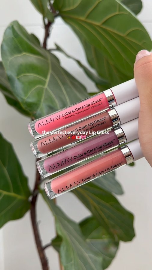 Instagram post by @lizapot.human for ALMAY. Caption reads: I found the perfect everyday Lip Gloss that will....